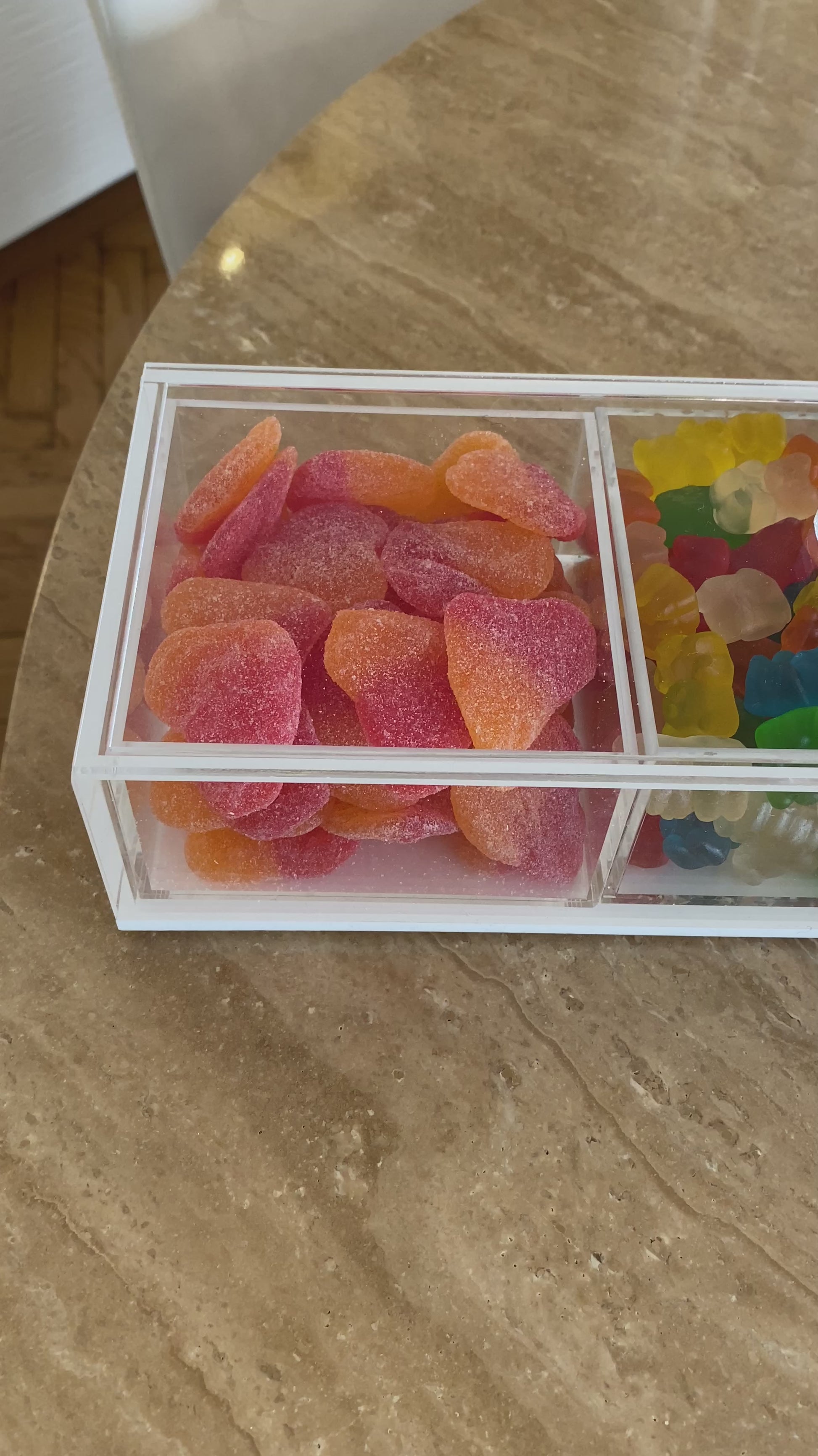 Three sectional lucite serving dish filled with kosher candy